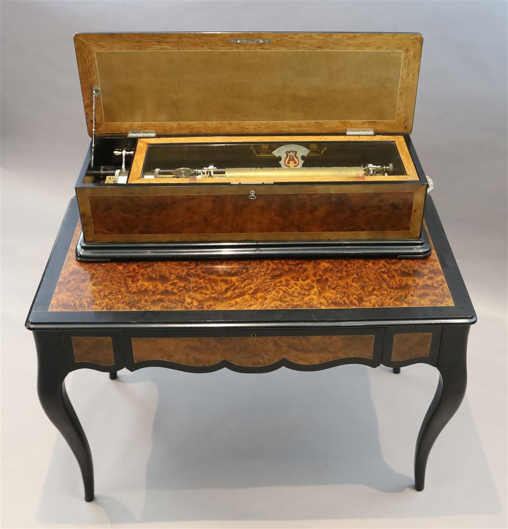 A 19th century Swiss Nicole Freres table musical box, width 44in. depth 24in. height overall 39in.